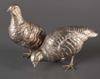 Lot 659 - A pair of plated metal table top partridge...