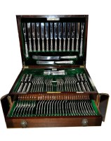 Lot 671 - A George V canteen of flatware, by Walker &...