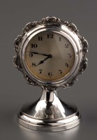 Lot 690 - A George V dressing table clock, by A. Buckley...