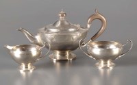 Lot 692 - A George V three-piece tea service, by Edward...