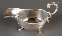 Lot 694 - A George VI sauce boat, by J* Co, London 1939,...