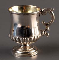 Lot 723 - A white metal christening cup, of half fluted...