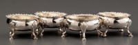 Lot 750 - A set of four George III table salts, by...