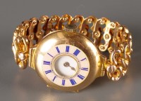 Lot 830 - A yellow metal cased lady's wristwatch, in...