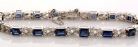 Lot 861 - A sapphire and diamond bracelet, the sixteen...