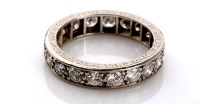 Lot 862 - A diamond eternity ring, c.1900, the brilliant...