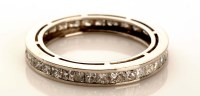 Lot 863 - A diamond set eternity ring, the princess cut...