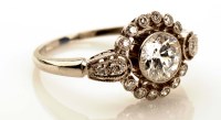 Lot 869 - A diamond cluster ring, c.1880, the central...