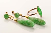 Lot 871 - A pair of jadeite earrings, c.1900, the carved...