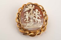 Lot 876 - A Victorian cameo and gold brooch, c.1870, the...