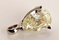 Lot 878 - A diamond pendant, the pear cut diamond...