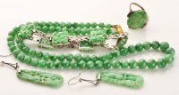 Lot 879 - A collection of jadeite jewellery, to include:...