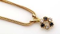 Lot 888 - A sapphire and diamond bracelet, the 9ct. gold...