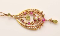 Lot 892 - A peridot, pearl, gold and synthetic ruby...