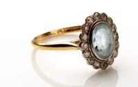 Lot 893 - An aquamarine and diamond ring, c.1900, the...