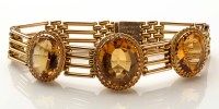 Lot 895 - A Victorian citrine and gold bracelet, c.1890,...