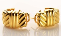 Lot 898 - A pair of yellow gold coloured earrings, of...