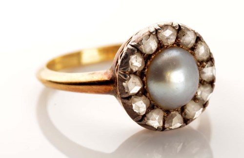 Lot 899 - A late Victorian pearl, diamond and gold ring,...