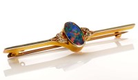 Lot 910 - An opal and diamond brooch, c.1900, the oval...