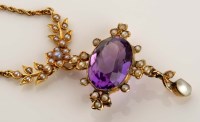 Lot 921 - An amethyst and seed pearl pendant necklace, c....