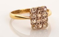 Lot 939 - A diamond cluster ring, c.1900, the oblong...