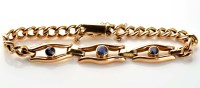 Lot 946 - A late Victorian sapphire and gold bracelet, c....