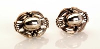 Lot 957 - Georg Jensen: a pair of silver earrings from...