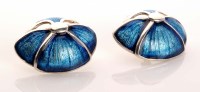 Lot 962 - Norman Grant: a pair of silver and blue enamel...