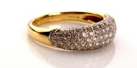 Lot 965 - A diamond dress ring, the upper section pave...