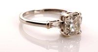Lot 972 - A single stone diamond ring, the cushion cut...