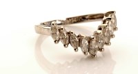 Lot 983 - A diamond dress ring, the V-shaped ring set...