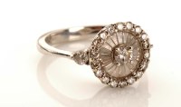 Lot 984 - A diamond cluster ring, the brilliant cut...