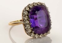 Lot 989 - An amethyst and diamond ring, the cushion cut...