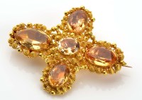 Lot 998 - An early Victorian topaz and gold brooch,...