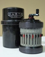 Lot 1128 - A Curta Type II mechanical calculator,...