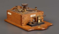 Lot 1169 - An early 20th Century crystal receiver in oak...