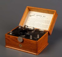 Lot 1171 - An Ericsson crystal receiver in oak case, with...