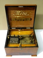 Lot 1176 - An early 20th Century walnut case Mira disc...