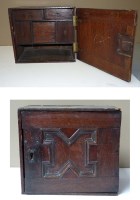 Lot 1202 - A 17th Century oak spice cabinet, the panelled...