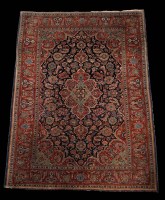 Lot 1235 - A mid 20th Century Tabriz rug, the central...