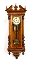 Lot 1244 - A late 19th Century Viennese walnut wall clock,...