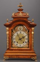 Lot 1250 - A late 19th Century walnut bracket clock,...