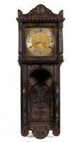 Lot 1257 - A large carved and ornate stained oak wall...