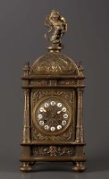 Lot 1261 - A French cast brass mantel clock, the dial...