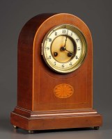 Lot 1262 - An Edwardian inlaid mahogany mantel clock,...