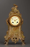 Lot 1279 - A French bronzed spelter mantel clock, with...