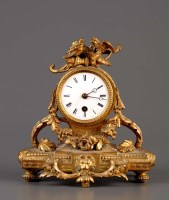 Lot 1286 - A late 19th Century gilt cased mantel clock,...