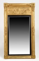 Lot 1308 - An early 19th Century pier glass, the frieze...