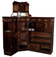 Lot 1310 - A late Victorian mahogany corner bookcase,...