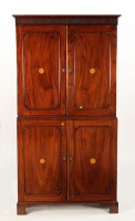 Lot 1324 - A 19th Century mahogany press cupboard, with...